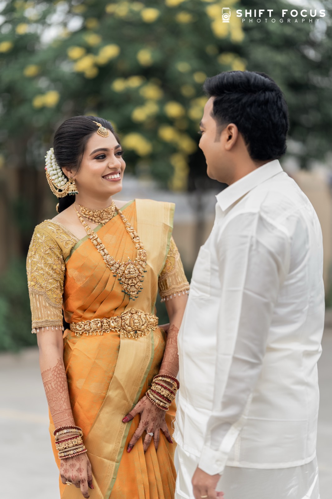 Bride smiling at the groom