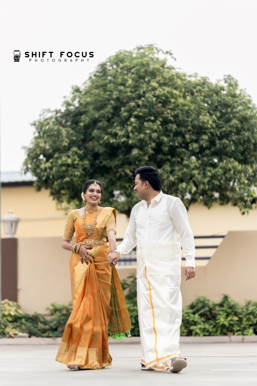 Couple walking hand in hand