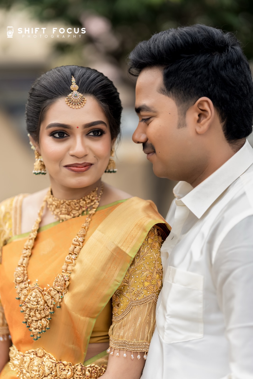 A quiet look between bride and groom